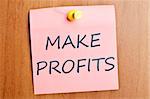 Make profits word  post it on wooden wall