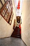 Chinese traditional corridor in wooden with red lantern.