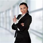 Confident business woman standing wearing elegant clothes with thumb up