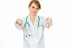 Displeased medical doctor woman showing thumbs down gesture isolated on white