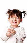 Beautiful expressive adorable happy cute laughing smiling baby infant toddler girl with ponytails showing teeth, isolated.