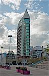 Lisbon story tower tourists architecture sky clouds