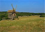 The old windmill in the village has historically been used previously for the production of flour. windmill is a beautiful landscape decoration