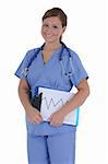 A attractive female nurse with a friendly smile standing holding a clipboard, isolated on a solid white background.