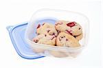 Leftover Strawberry Shortcake Cookies in Plastic Container Isolated on White.