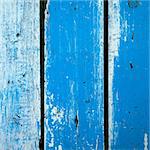 Surface of old wood Paint over with white and blue vertical