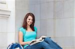 Young woman studying on campus