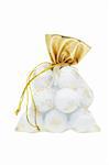 Golf balls in gift sachet on white background