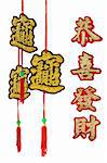 Happy Chinese new year greetings with decorative hanging ornaments on white background