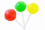 Three colorful lollipops on white background