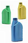 Three colorful plastic containers on white background