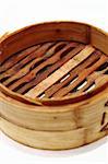 Chinese steamed dimsum in bamboo containers traditional cuisine