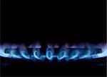 Square composition of gas burner isolated on black background