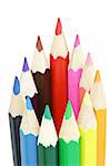 Assortment of multi colored pencils on white background