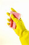 Rubber glove with a sponge isolated on a white background