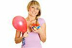 Close-up of an attractive young woman with balloons and gift box. Isolated on a white background