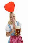 Woman in Dirndl with beer mug