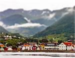 Nordic town in the mountains in front of a fjord in Lofoten Norway