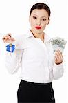 Beautiful businesswoman holding euros bills and hose keys - real estate loan concept