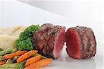 fresh and tasty beef grilled steak with vegetable in a plate.