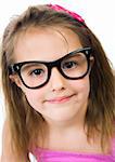 Pretty young girl in glasses against isolated white background