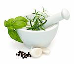 Preparation of marinade in Mortar - Salt, Rosemary, basil, garlic and pepper - with clipping path
