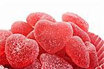Red heart shaped jelly sweets on a white background