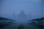 Taj Mahal in a fog view from back side of river