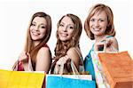 Three attractive young women with bag isolated