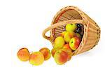 Fresh apples spilling out of basket - isolated on white background. Clipping path included.