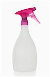 Pink spray bottle against a white background