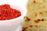 Spicy and hot chili chutney(sauce) with indian roti