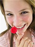 Portrait Of Teenage Girl Eating Lollipop