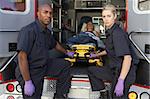 Paramedics preparing to unload patient from ambulance