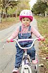 Little girl on bicycle