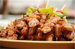 Thai cuisine barbecue chicken skewers at Chatuchak weekend market in Bangkok, Thailand