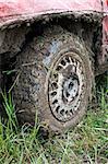 Muddy car tire from car race