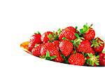 heap of red fresh ripe appetizing strawberries on plate