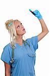 A beautiful young female doctor holding a test tube vial sample of blood