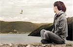 Young girl relaxing outdoor at dawn