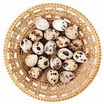 quail eggs in a basket