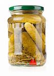 pickles in a glass jar is isolated on a white background