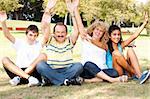 Cute young family having fun in the nature.