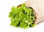 fresh salad lettuce in a paper package