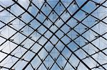 Modern symmetrical transparent glass roof with metal supporting frame