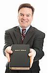 Minister, missionary, or bible salesman, presenting the bible to you.  Isolated on white.