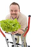 Overweight man with healthy lifestyle choices - exercising and eating fresh food, isolated