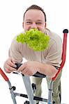 Power slimming concept - man exercising and eating healthy fresh food, isolated