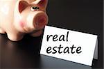 save money for real estate in your piggy bank