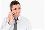 Happy man making a phone call against a white background